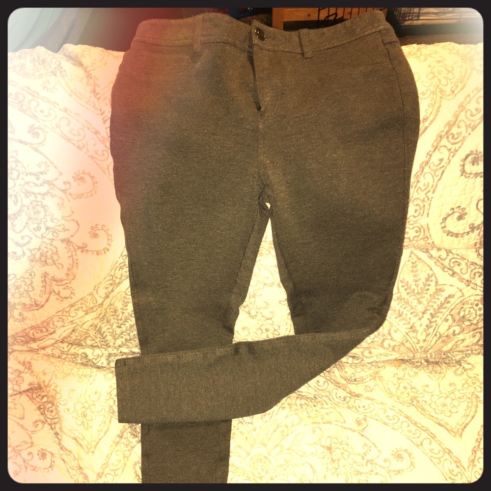 Grey fitted pants.